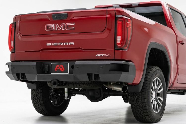 Close‑up of GMC Sierra 2500/3500 rear bumper detailing reinforced craftsmanship.