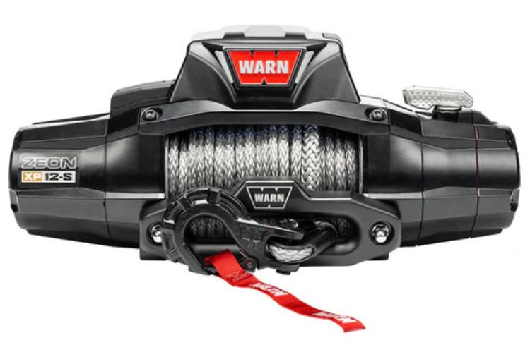 Truck winch in action during off-road recovery