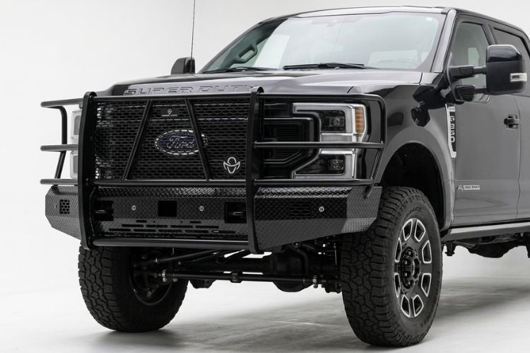 Heavy duty Ranch Hand Legend series steel pipe front bumper with full headlight mesh protection to prevent deer damage.