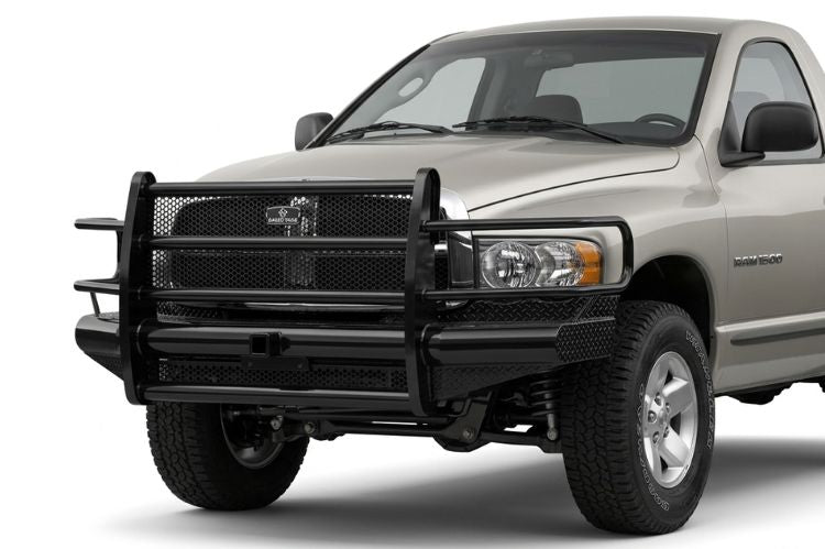 Ranch Hand heavy-duty front bumper with a full wrap-around grille guard installed on a 1994-2002 Dodge Ram 1500 truck.