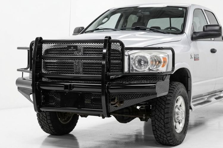 Ranch Hand heavy duty black steel front bumper with full grille guard protection mounted on a 2006-2009 Dodge Ram 2500 truck.