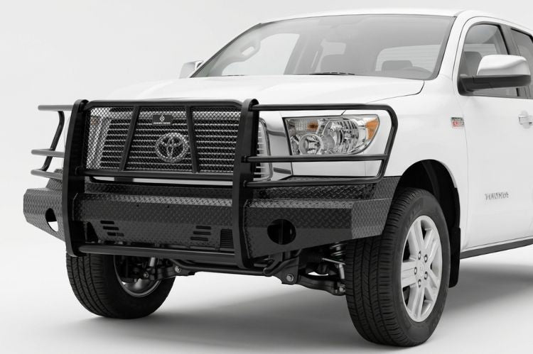 Ranch Hand heavy duty black steel front bumper replacement with full grille guard protector mounted on a 2007-2013 Toyota Tundra truck.