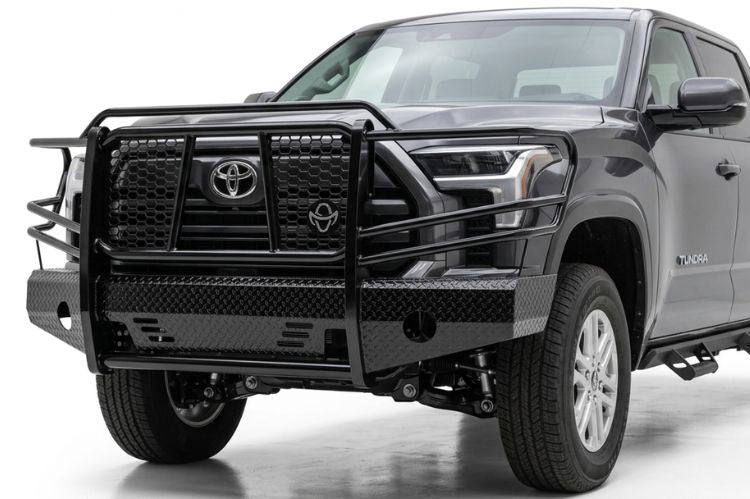 Ranch Hand heavy duty black steel front bumper replacement with full grille guard protection installed on a 2014-2022 Toyota Tundra truck.