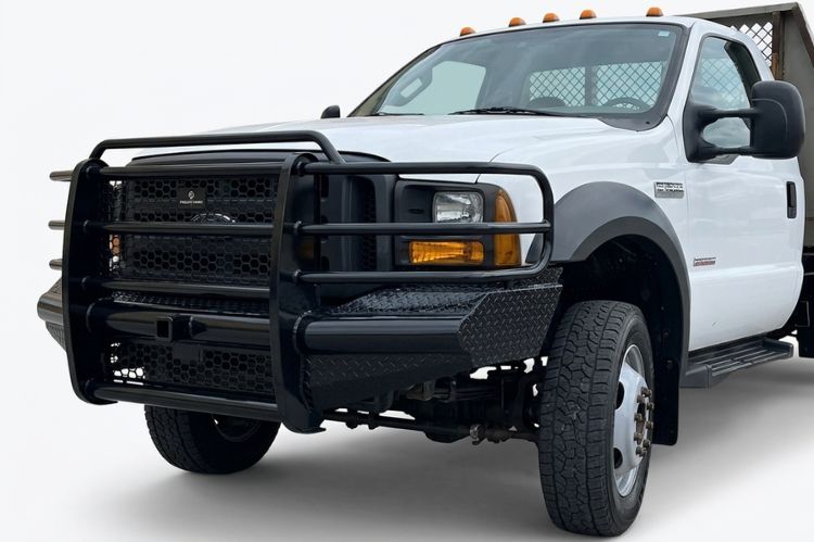 Ranch Hand Legend Series front bumper with full grille guard on a 2005-2007 Ford Super Duty F550 work truck.