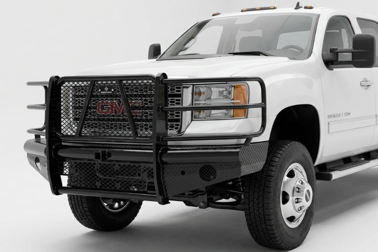 Heavy-duty Ranch Hand Legend front replacement bumper with full grille guard on a 2009 GMC Sierra 2500HD.