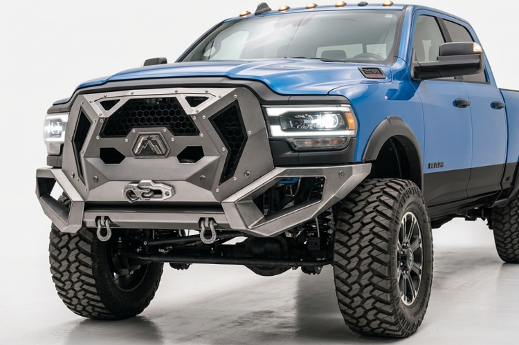 Lifted truck with bumper installed for enhanced protection.