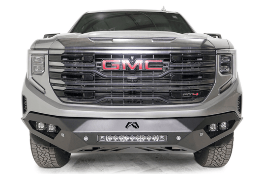 Silver GMC Sierra truck's front end showcasing the Fab Fours Vengeance bumper, model GS23-D5851-1, for 2022.5-2024