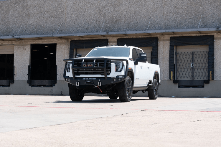 Road Armor Stealth 2242F2B Front Bumper with Titan II Guard installed on a 2024 GMC Sierra 2500 HD, featuring textured black finish, winch compatibility, and aggressive off-road styling.