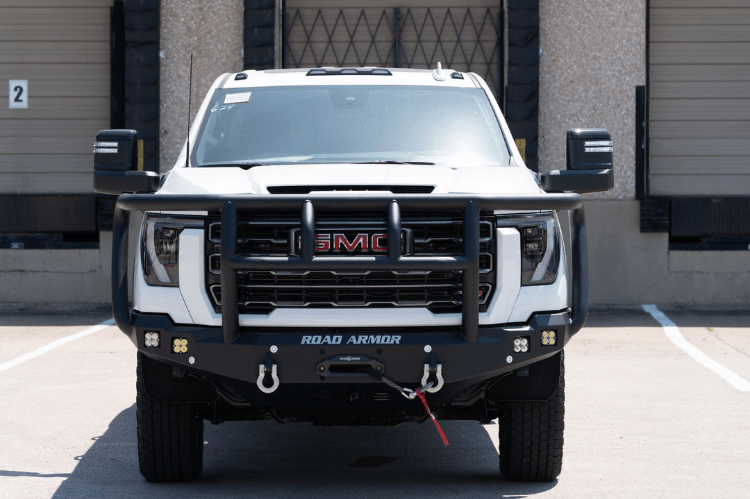 Road Armor Stealth 2242F2B Front Bumper with Titan II Guard installed on a 2024 GMC Sierra 2500 HD, featuring textured black finish, winch compatibility, and aggressive off-road styling.