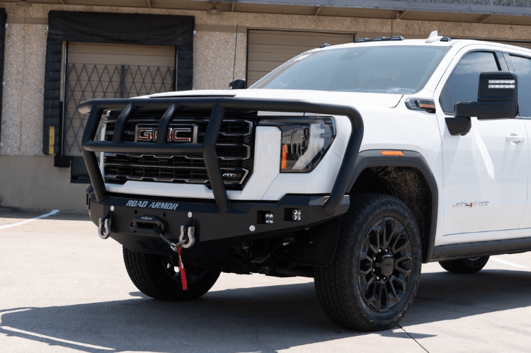 Road Armor Stealth 2242F2B Front Bumper with Titan II Guard installed on a 2024 GMC Sierra 2500 HD, featuring textured black finish, winch compatibility, and aggressive off-road styling.