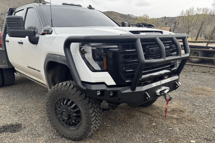 Road Armor Stealth 2242F2B Front Bumper with Titan II Guard installed on a 2024 GMC Sierra 2500 HD, featuring textured black finish, winch compatibility, and aggressive off-road styling.