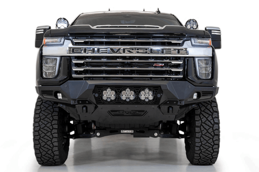 Front view of a black Chevy truck featuring a large ADD F270014100103 Bomber Black front bumper, designed for 2020-2023 Silverado 2500/3500 model