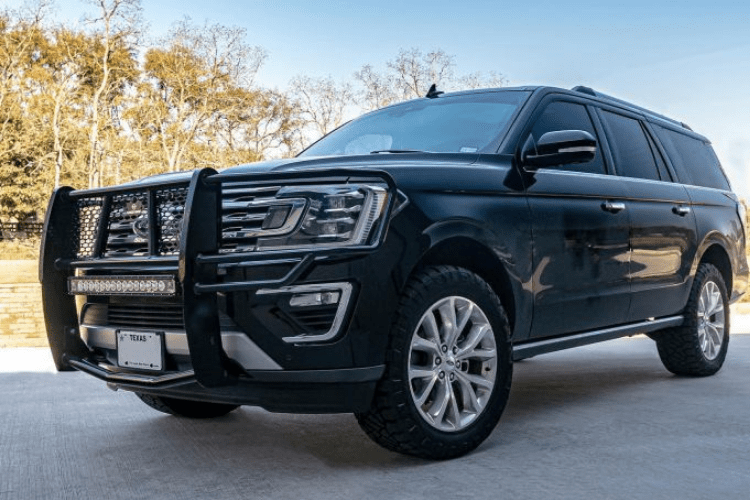 Heavy-duty Ranch Hand GGF19HBL1C grille guard for Ford Expedition with integrated camera cutout and front-end protection