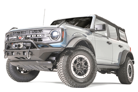 Fab Fours FB21-B5252-1 stubby front bumper with pre-runner guard on 2021-2024 Ford Bronco, designed for high clearance, rugged off-road protection, and enhanced grille defense