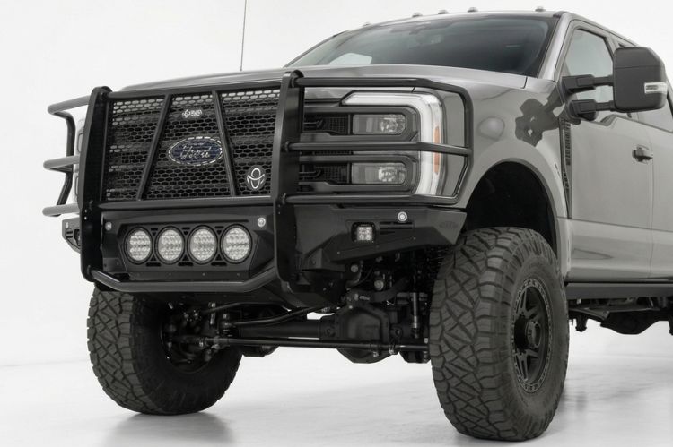 Heavy‑duty brush guard mounted on the front of a pickup truck