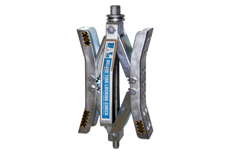 Cargo gear and tools like wheel chocks, trailer aid, and tire levelers for secure trailer maintenance and hauling