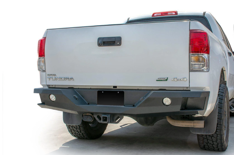 Browse DV8 Offroad aftermarket rear bumpers designed for durability, aggressive styling, and enhanced off-road protection