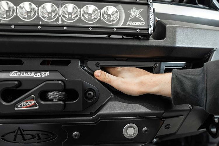 White Ford Superduty truck's front end showcasing the ADD F810335070103 black Phantom winch bumper, model years 2023-2025