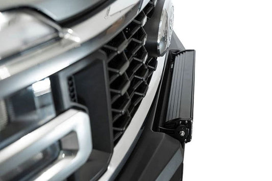 White Ford Superduty truck's front end showcasing the ADD F810335070103 black Phantom winch bumper, model years 2023-2025