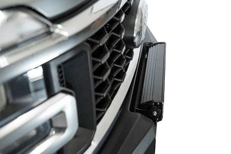 White Ford Superduty truck's front end showcasing the ADD F810335070103 black Phantom winch bumper, model years 2023-2025
