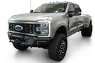 White Ford Superduty truck's front end showcasing the ADD F810335070103 black Phantom winch bumper, model years 2023-2025