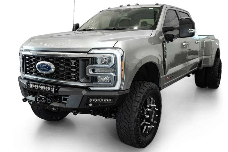 White Ford Superduty truck's front end showcasing the ADD F810335070103 black Phantom winch bumper, model years 2023-2025