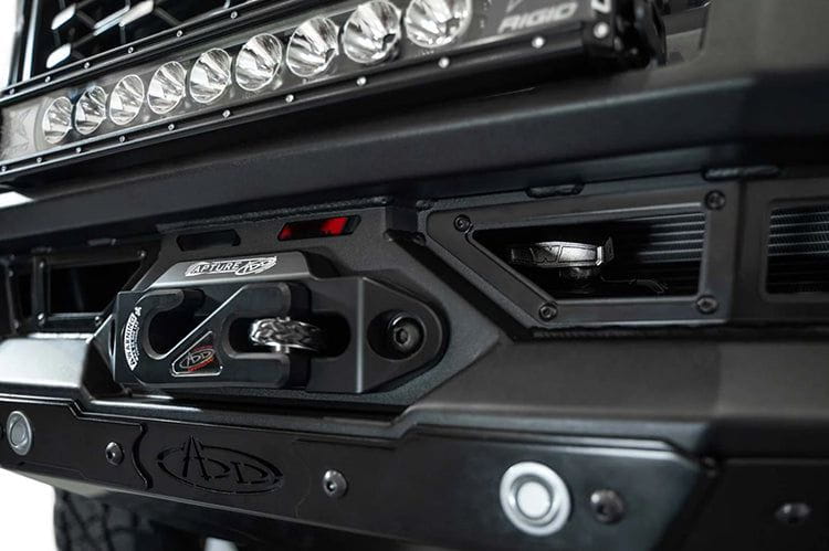 White Ford Superduty truck's front end showcasing the ADD F810335070103 black Phantom winch bumper, model years 2023-2025