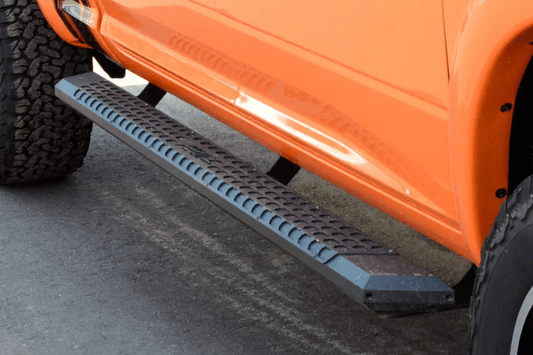 Durable Aries AdvantEDGE black aluminum side bars for Dodge Ram 2500/3500 trucks.