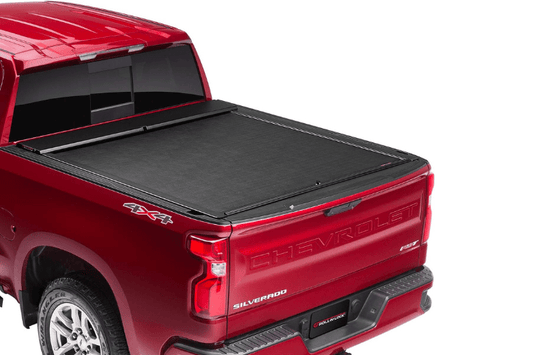 Roll-N-Lock M-Series 1999-2006 GMC Sierra 2500/3500 6.5' Tonneau Cover with Bedrail Caps LG208M