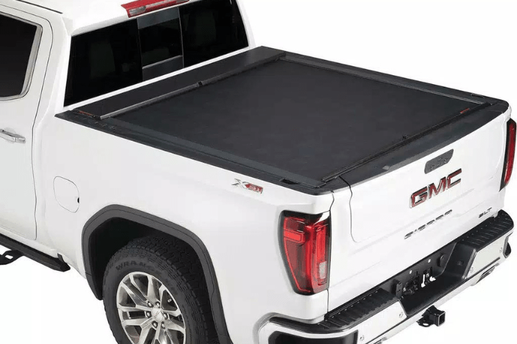Roll-N-Lock M-Series 1999-2006 GMC Sierra 2500/3500 6.5' Tonneau Cover with Bedrail Caps LG208M