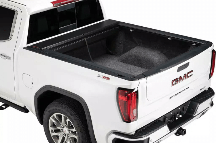Roll-N-Lock M-Series 1999-2006 GMC Sierra 2500/3500 6.5' Tonneau Cover with Bedrail Caps LG208M