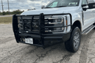 Heavy-duty aftermarket bumper with receiver tube for Ford F-250/F-350 2011-2016, Roughneck RGNK-BFERF11SDR for off-road protection.