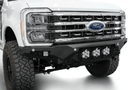 White truck front end showcasing a robust ADD Bomber Black bumper F810014100103, designed for Ford Superduty 2023-2025 models