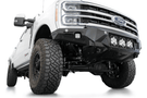 White truck front end showcasing a robust ADD Bomber Black bumper F810014100103, designed for Ford Superduty 2023-2025 models