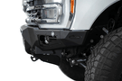 White truck front end showcasing a robust ADD Bomber Black bumper F810014100103, designed for Ford Superduty 2023-2025 models