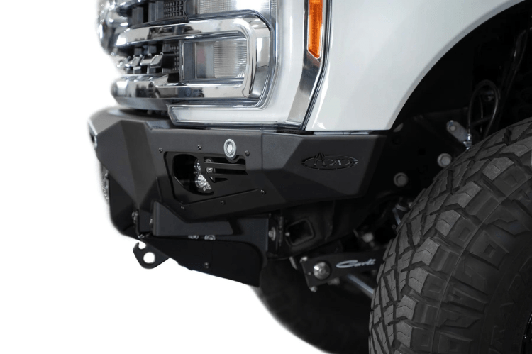 White truck front end showcasing a robust ADD Bomber Black bumper F810014100103, designed for Ford Superduty 2023-2025 models
