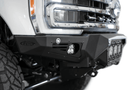 White truck front end showcasing a robust ADD Bomber Black bumper F810014100103, designed for Ford Superduty 2023-2025 models