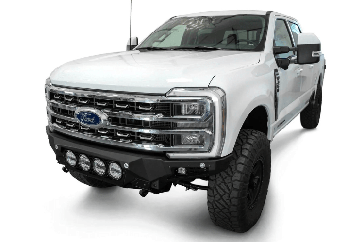 White truck's front end showcasing ADD Bomber Black bumper F810014110103, compatible with Ford Superduty models 2023-2025