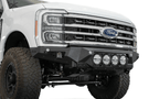 White truck's front end showcasing ADD Bomber Black bumper F810014110103, compatible with Ford Superduty models 2023-2025