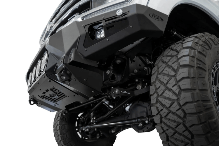 White truck's front end showcasing ADD Bomber Black bumper F810014110103, compatible with Ford Superduty models 2023-2025