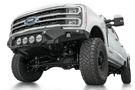 White truck's front end showcasing ADD Bomber Black bumper F810014110103, compatible with Ford Superduty models 2023-2025