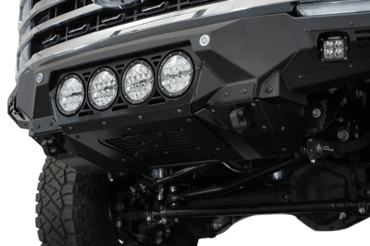 White truck's front end showcasing ADD Bomber Black bumper F810014110103, compatible with Ford Superduty models 2023-2025