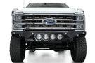 White truck's front end showcasing ADD Bomber Black bumper F810014110103, compatible with Ford Superduty models 2023-2025