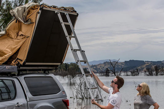 ARB Simpson III rooftop tent with annex 803804 mounted on a truck, featuring a spacious overland shelter