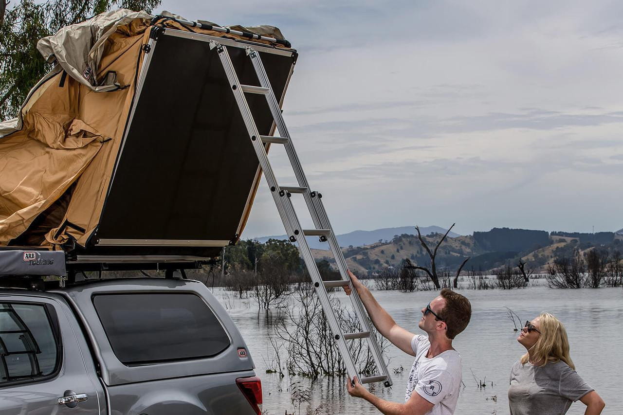 ARB Simpson III rooftop tent with annex 803804 mounted on a truck, featuring a spacious overland shelter
