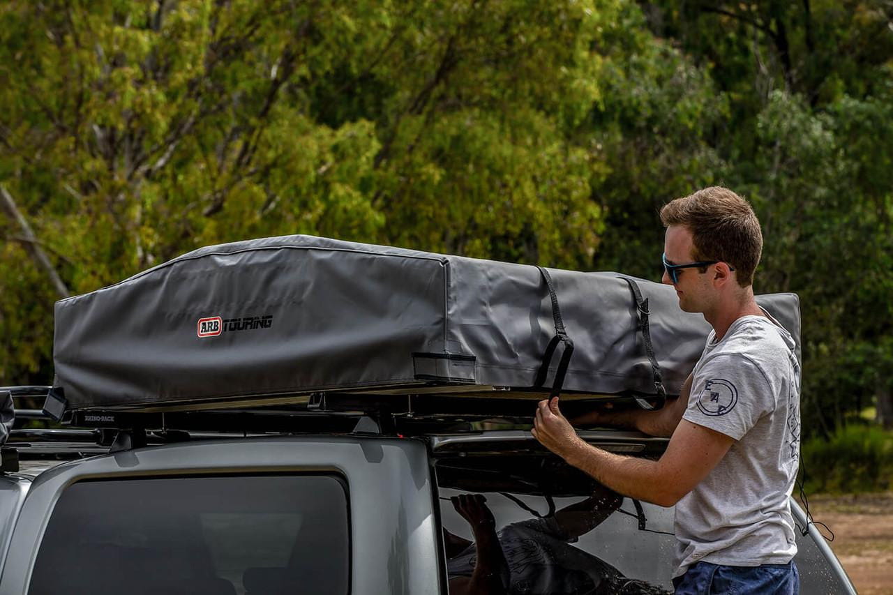 ARB Simpson III rooftop tent with annex 803804 mounted on a truck, featuring a spacious overland shelter