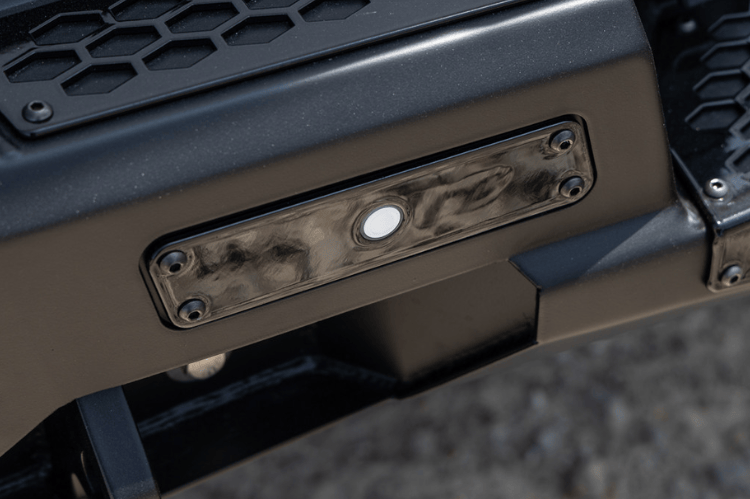 Aftermarket back bumper MFC20BYB for Chevy Silverado 2500/3500 with parking sensor cutouts and bare metal finish