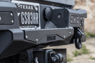 Aftermarket back bumper MFC20BYB for Chevy Silverado 2500/3500 with parking sensor cutouts and bare metal finish