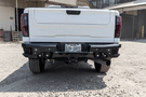 Aftermarket back bumper MFC20BYB for GMC Sierra 2500/3500 with parking sensor cutouts and bare metal finish