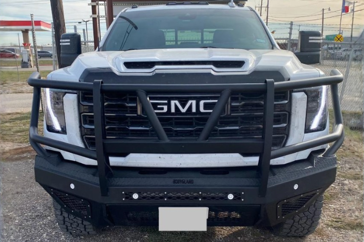 Aftermarket Bodyguard bumper for GMC Sierra truck front-end replacement.